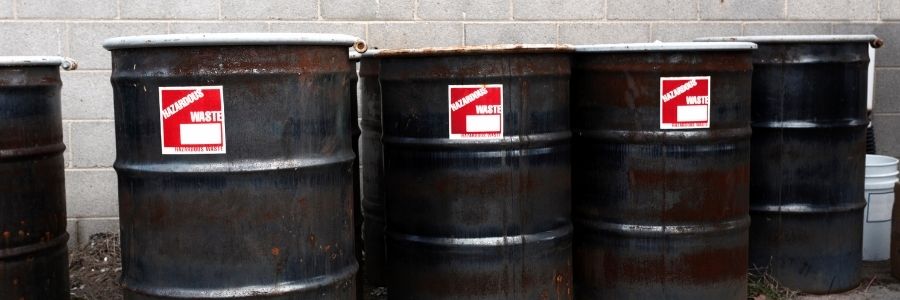Hazardous Waste Barrels Black hazardous waste barrells