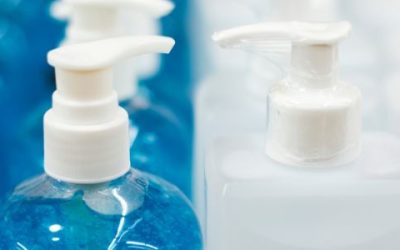 Bottles of blue and white hand sanitizer